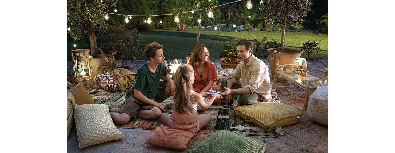 People gathered in the grass